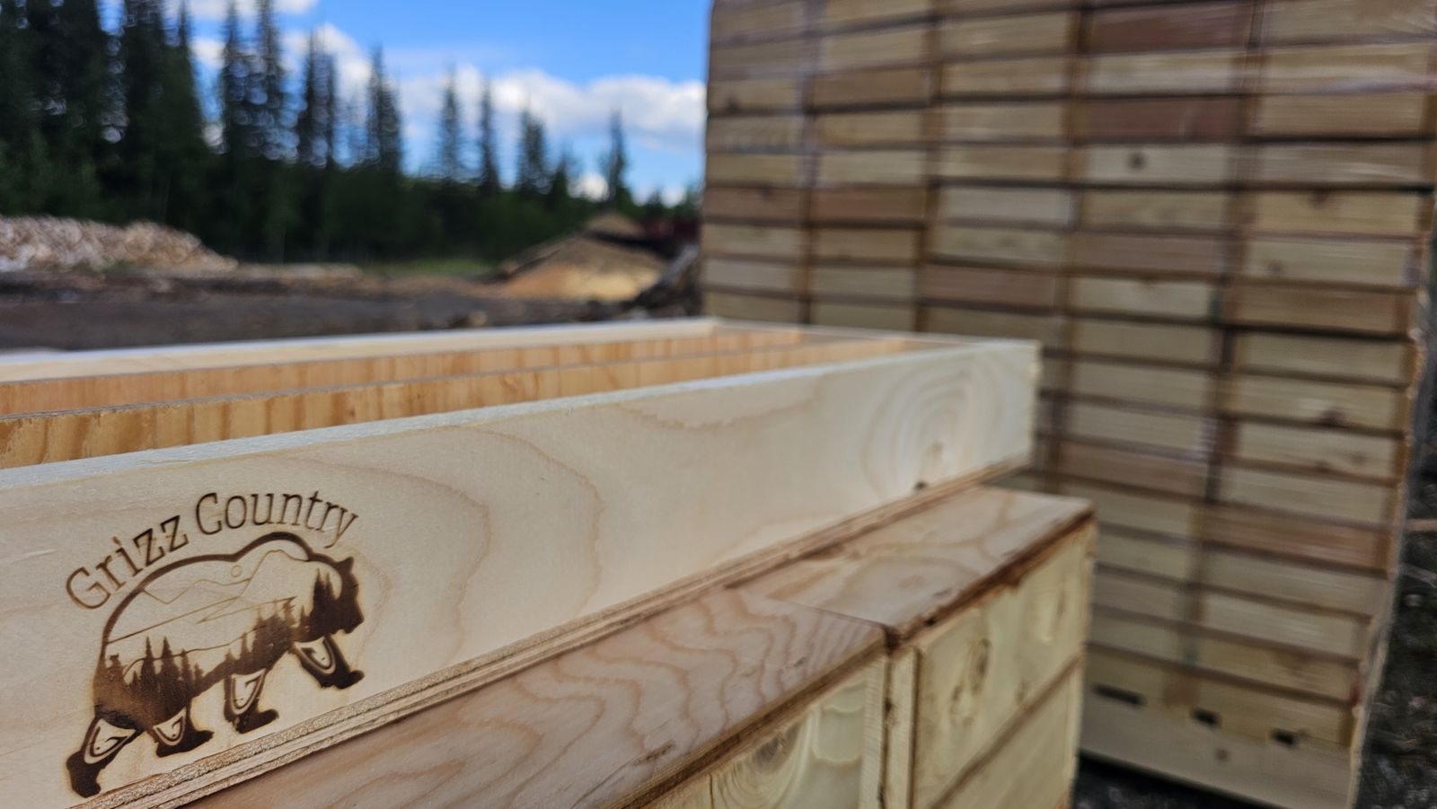 Close up of a core box branded with the Grizz Country bear